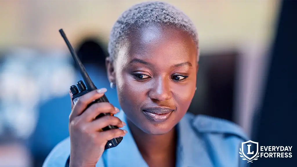 Woman using walkie-talkie for emergency communication