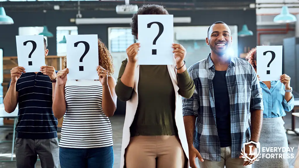 Confident man standing in front of team, symbolizing leadership and clarity